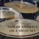 pair of cymbals on a drum set