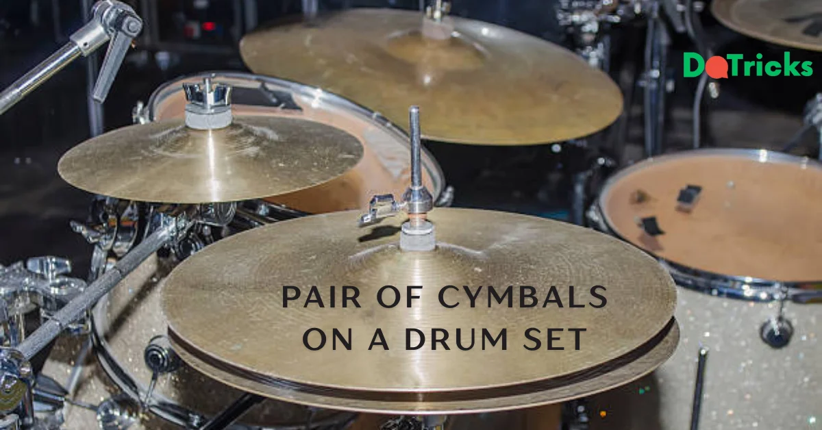 pair of cymbals on a drum set